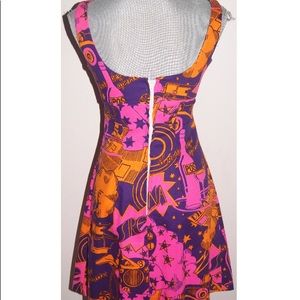 A fun, bright and funky 70-80’s style fit and flare dress!